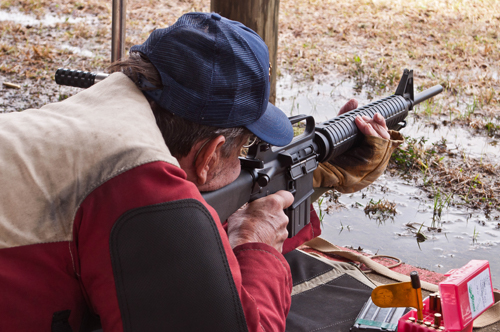 man with ar shooting modern military category