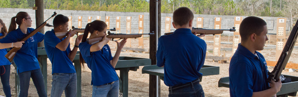 air rifle match competitor standing