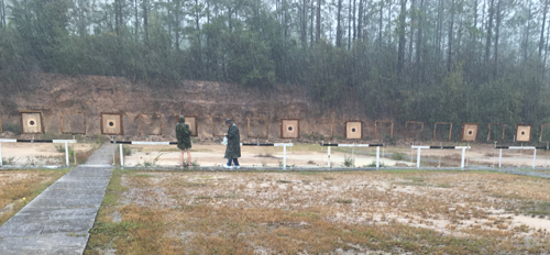 pistol match while raining