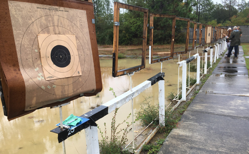 pistol match while raining