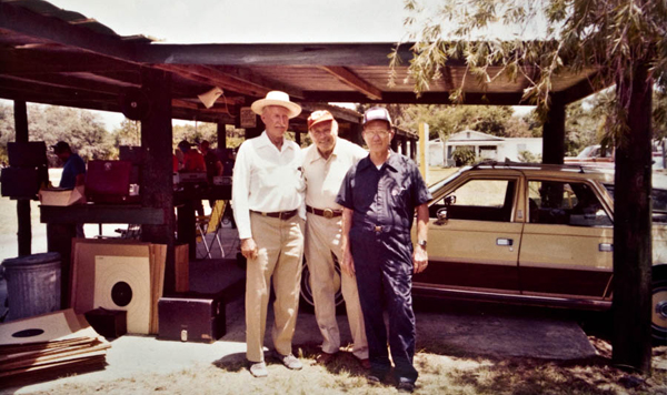 competitors in small group for photo at pistol range