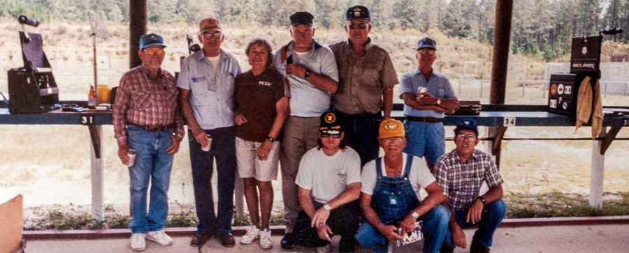 group of pistol competitors after the match