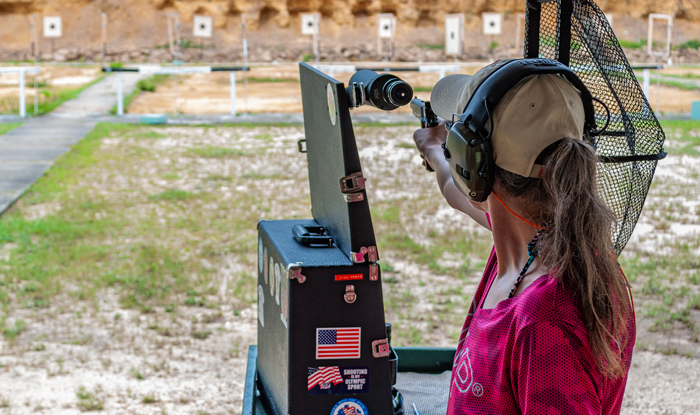 Girl shooting precision pistol competition